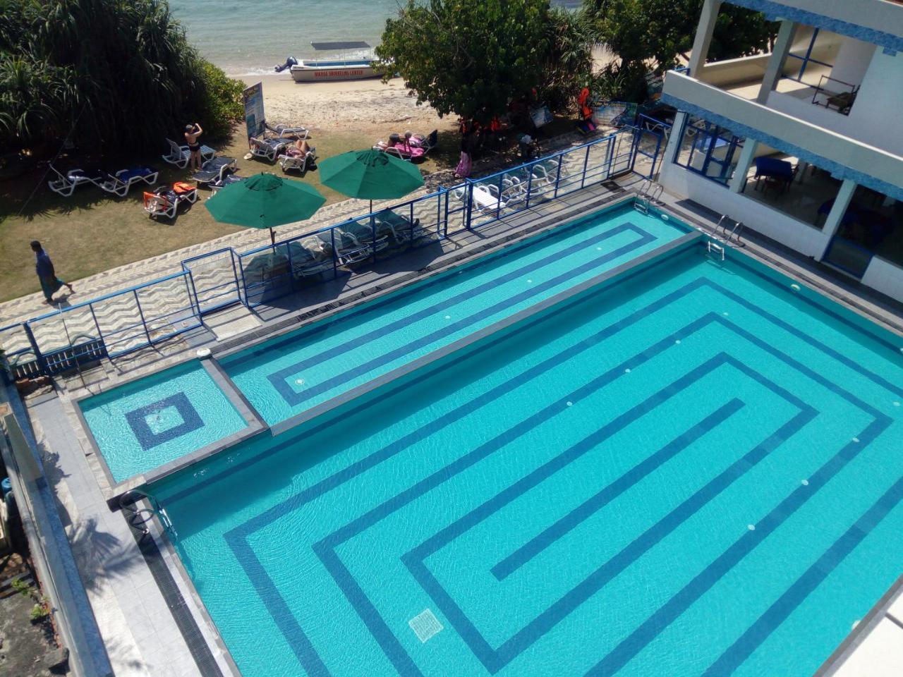 Paradise Beach Resort & Diving School Mirissa Exterior foto